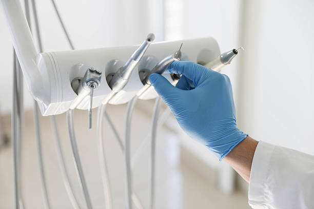 Professional Tooth Extraction technician working in Mesilla, NM